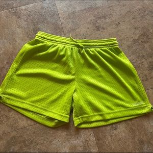 Lime green Reebok running shorts